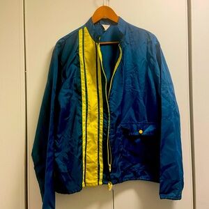 ‘80’s Vintage windbreaker bomber jacket. Aqua w/ yellow stripe. Great shape.